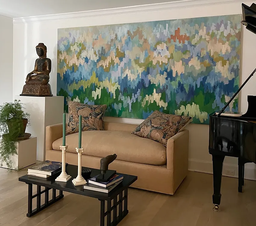 Large scale painting hanging in living room